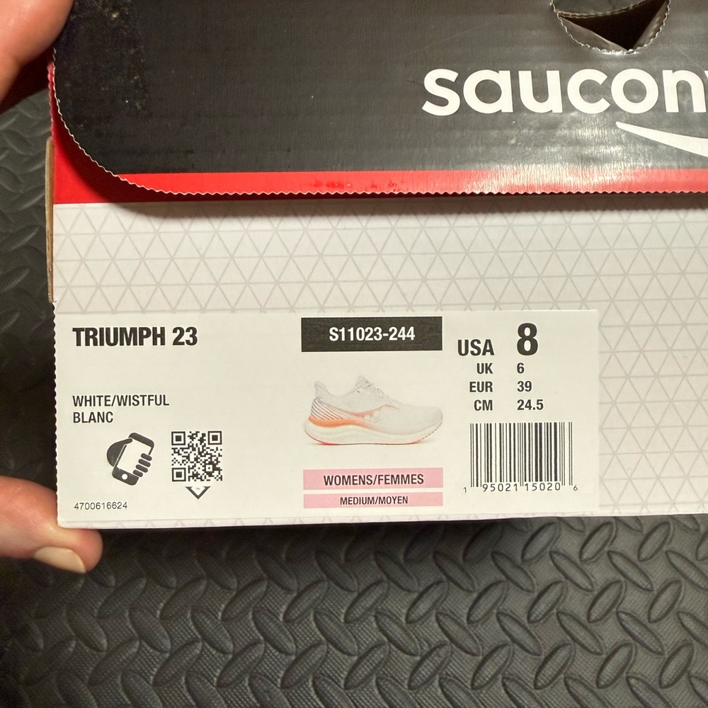 Saucony Running Shoes with White and Orange Accents